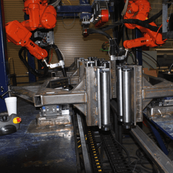 Automated robotic assembly cell with fixtures