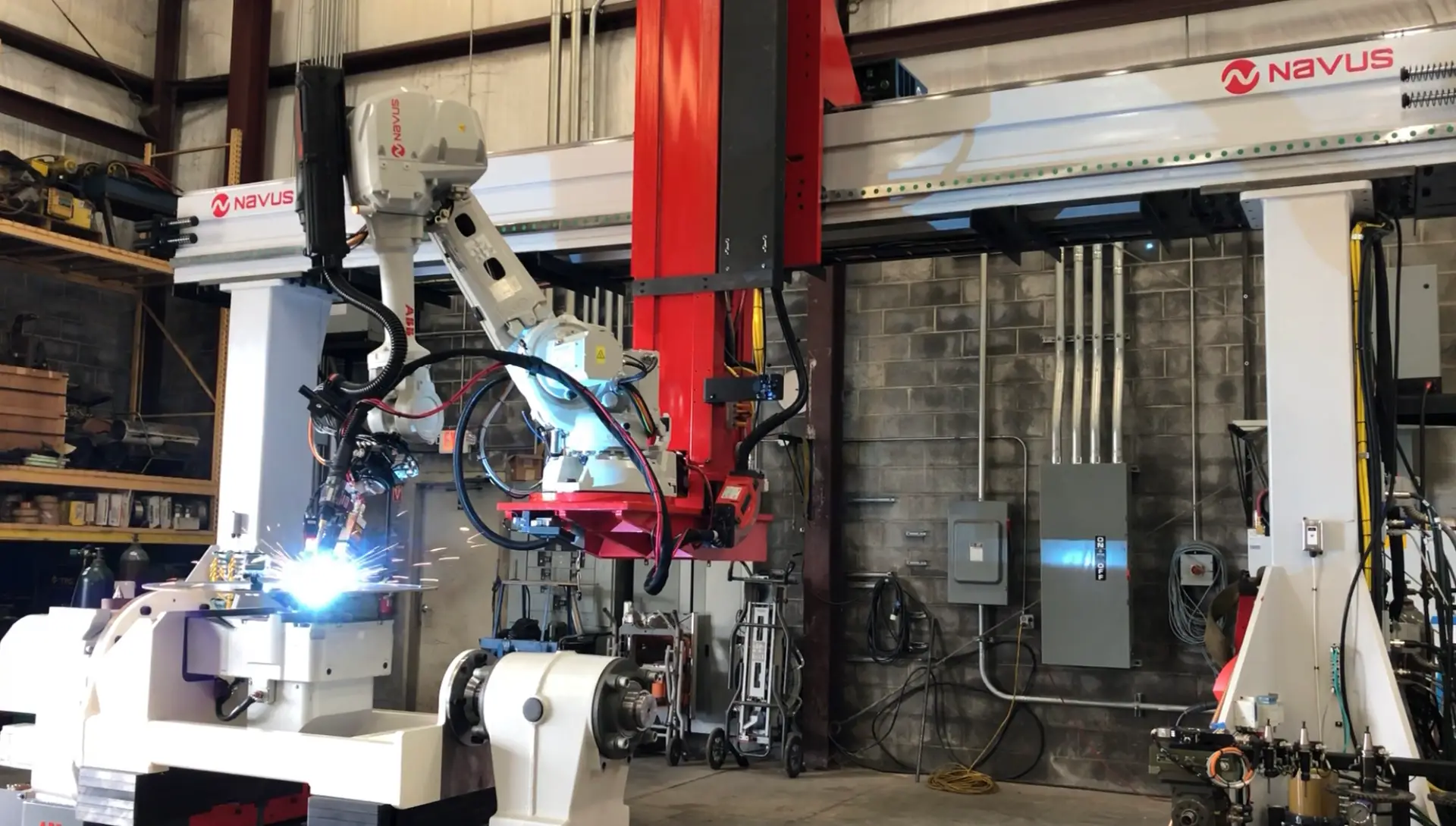 Industrial robotic arm in a workshop.